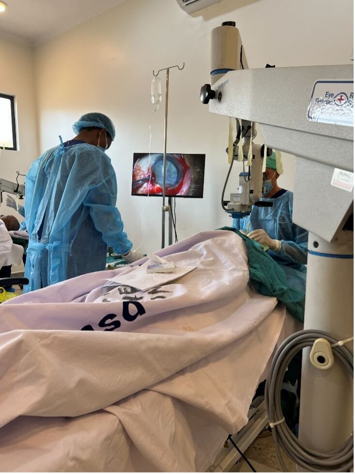 Cataract surgery in progress at the clinic in Karatu, with the operation shown on screen