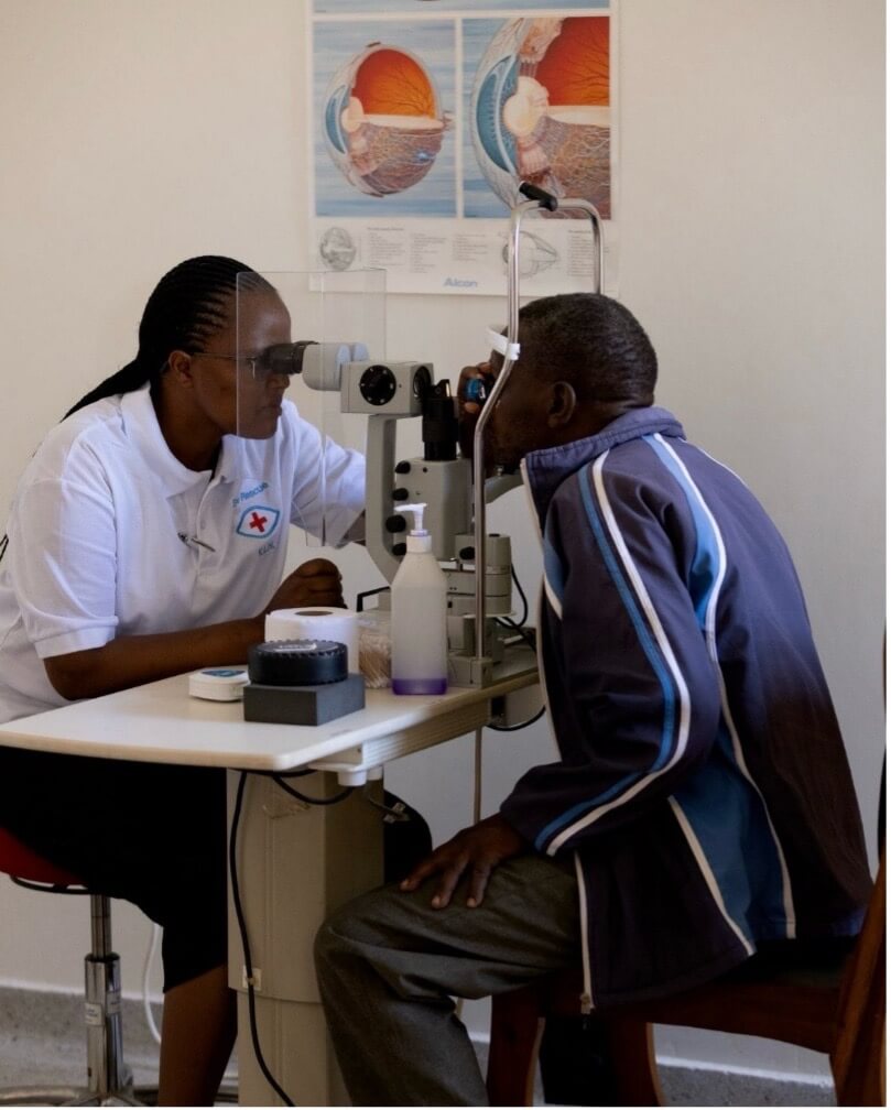 Examination at a slit lamp in the eye clinic in Karatu